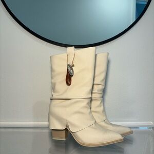 Cream boots with a small heal